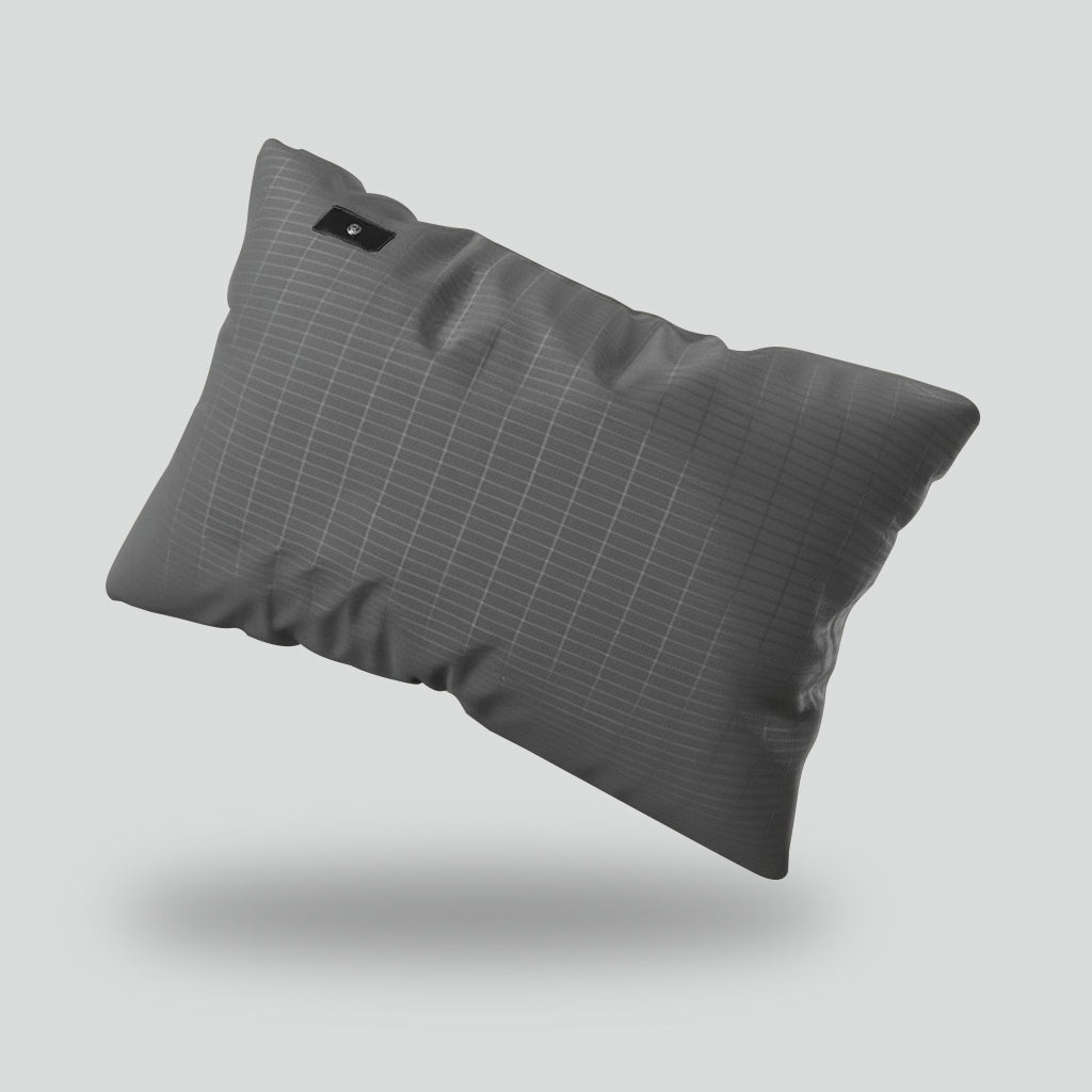 Grey Earthedin grounding pillowcase with its conductive silver grid and snap connection